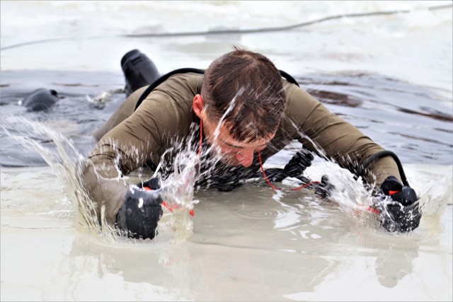 Students participate in cold-water immersion training for CWOC Class 19-01 at Fort McCoy