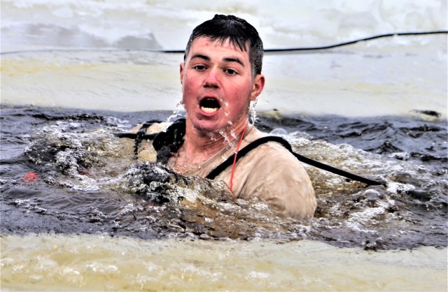 Students participate in cold-water immersion training for CWOC Class 19-01 at Fort McCoy