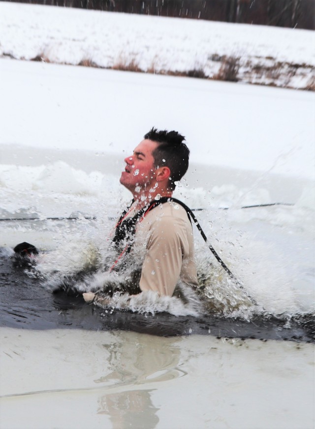 Students participate in cold-water immersion training for CWOC Class 19-01 at Fort McCoy