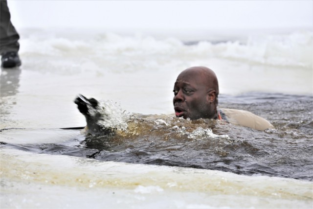 Students participate in cold-water immersion training for CWOC Class 19-01 at Fort McCoy