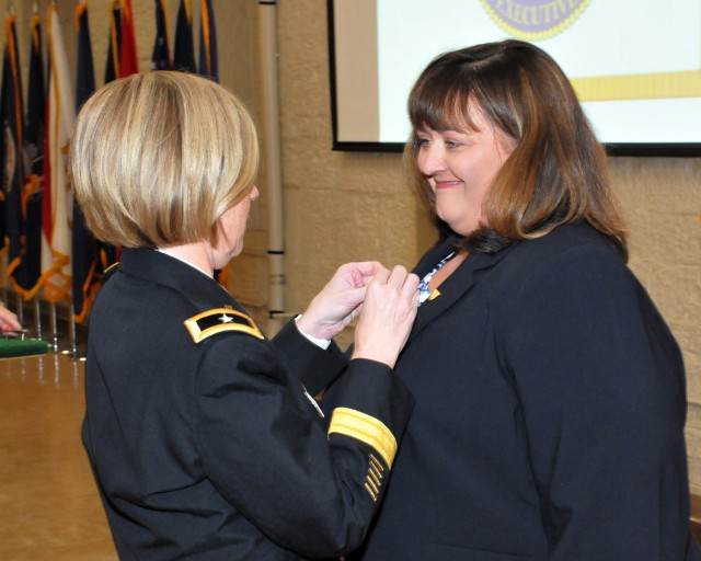 Fisher joins ranks as Senior Executive Service leader