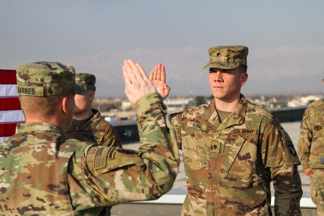 Specialist Byrd flies high during his reenlistment in the Middle East