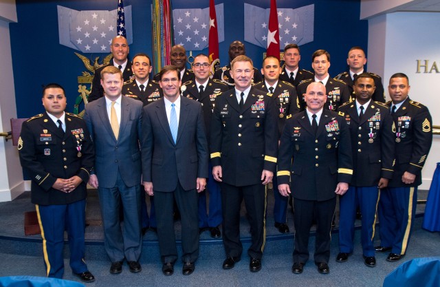 Army secretary honors top recruiters