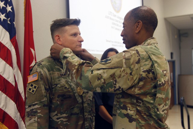 8th TSC Mortuary Affairs NCO receives the Honorable Order of Saint Martin