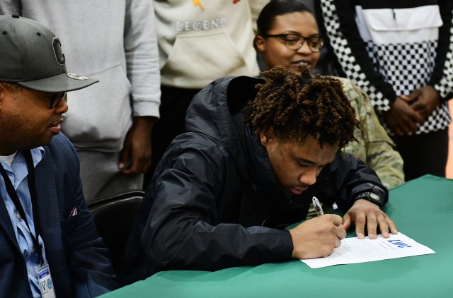 Fort Knox High senior signs letter of intent to play football 'at next level'