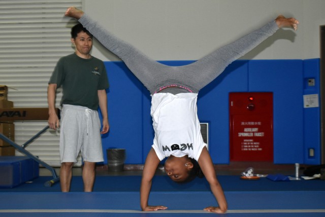 Camp Zama youth gymnastics class balances fun, challenge