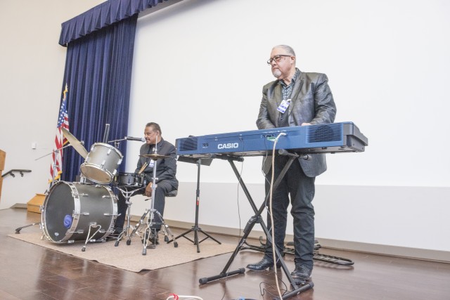 Performance by Musicians David Fuller and Rollins Ross