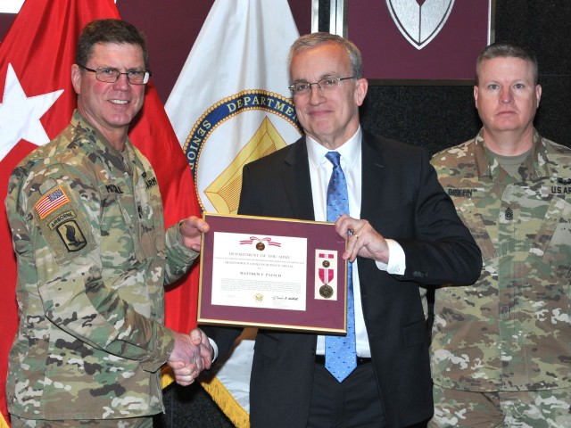 Pasuch recieves award