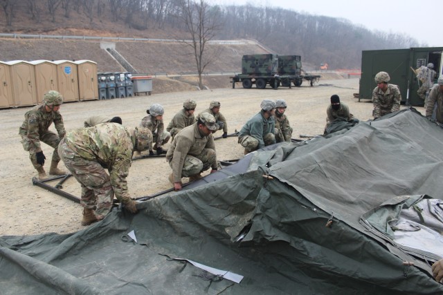 Soldiers from B Co. establishing field hospital