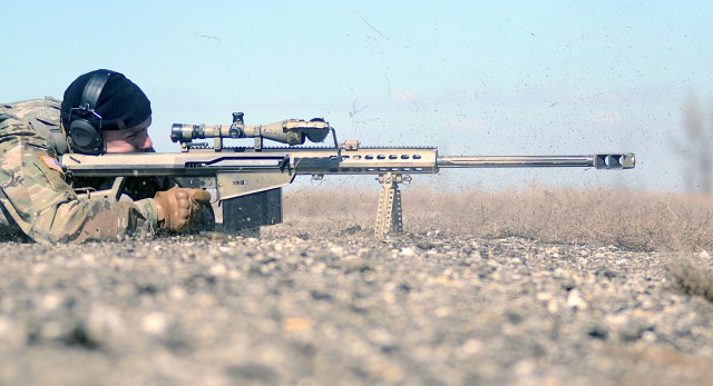 Visiting Soldiers conduct weapons training at Fort Riley