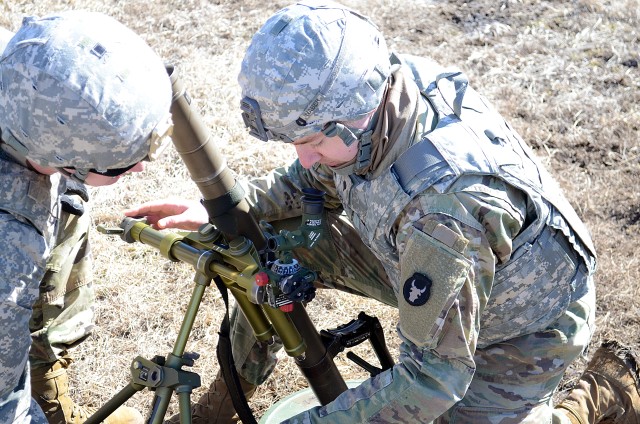 Visiting Soldiers conduct weapons training at Fort Riley