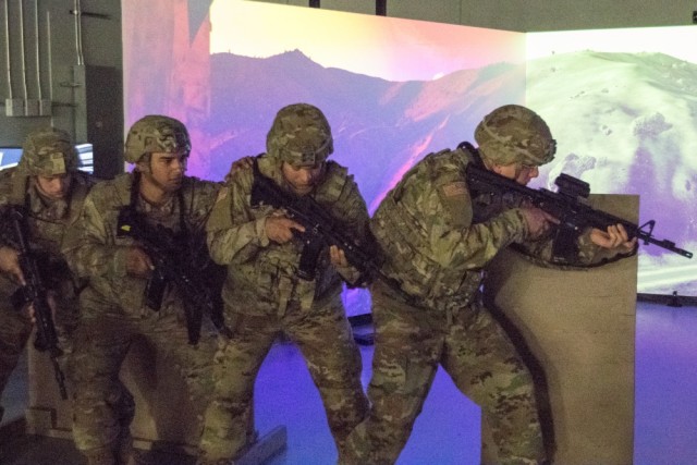 Fort Drum Soldiers training with the Army's Squad Advanced Marksmanship Trainer (SAM-T)