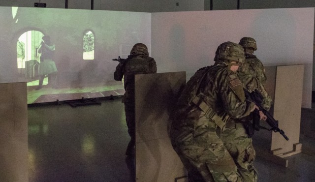 Fort Drum Soldiers training with the Army's Squad Advanced Marksmanship Trainer (SAM-T)