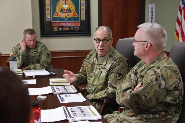 DISCUSSING CONTRACTING ACCOMPLISHMENTS