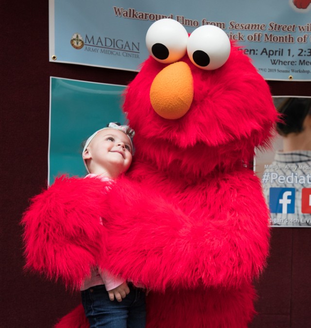 Elmo comes to Madigan