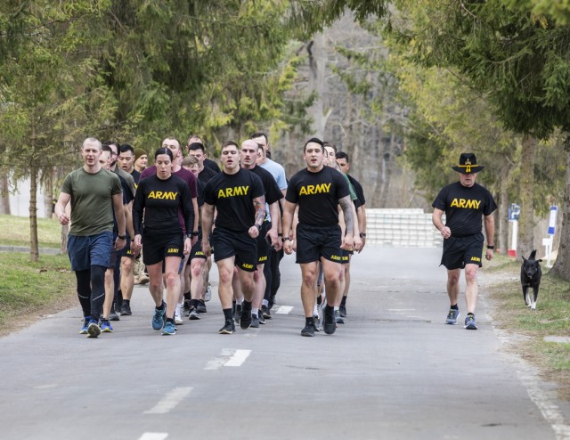 Soldiers participate in the time-honored 'Order of the Spur'