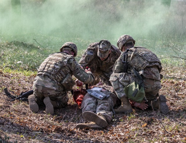 Soldiers participate in the time-honored 'Order of the Spur'