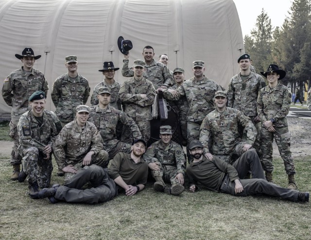 Soldiers participate in the time-honored 'Order of the Spur'