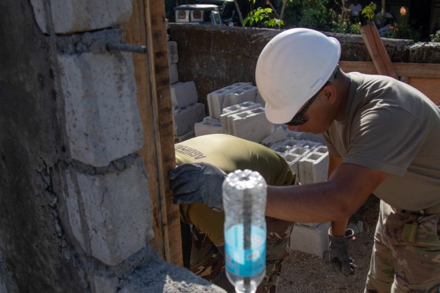 Soldier Returns Home to the Philippines, Helps Build School