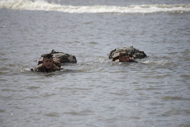 1st Lt. Jeremy Y. Matsumoto and Capt. Erwin J. Marciniak from 299th Brigade Engineer Battalion, 1st Stryker Brigade Combat Team, 4th Infantry Division, conduct water borne operations.