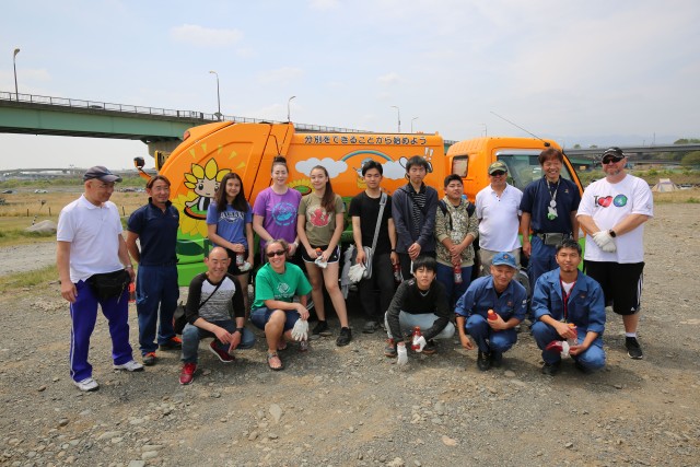Camp Zama residents work with Japanese volunteers to clean up for Earth Day