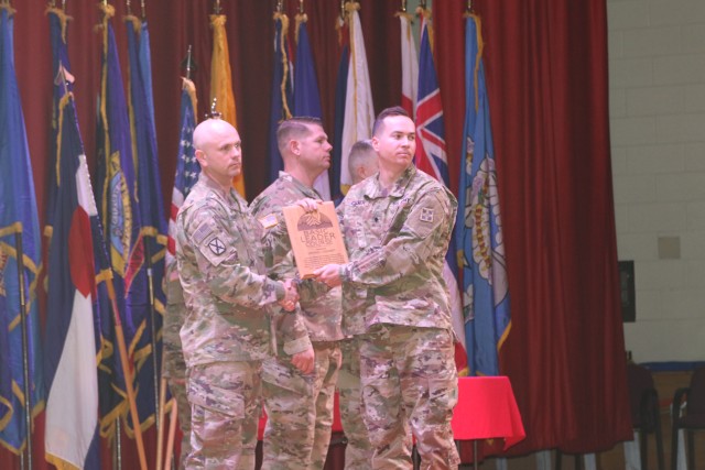 Spc. Matthew C. Culver receives the Distinguisded Honor Graduate award.