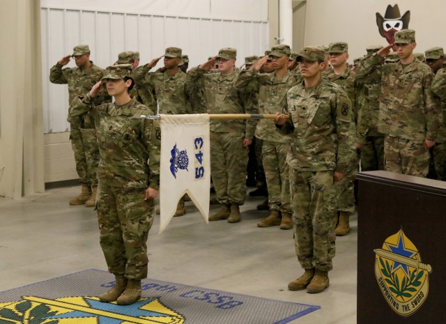 543rd Composite Supply Company cases their colors in preparation for their upcoming deployment to support Operation Atlantic Resolve