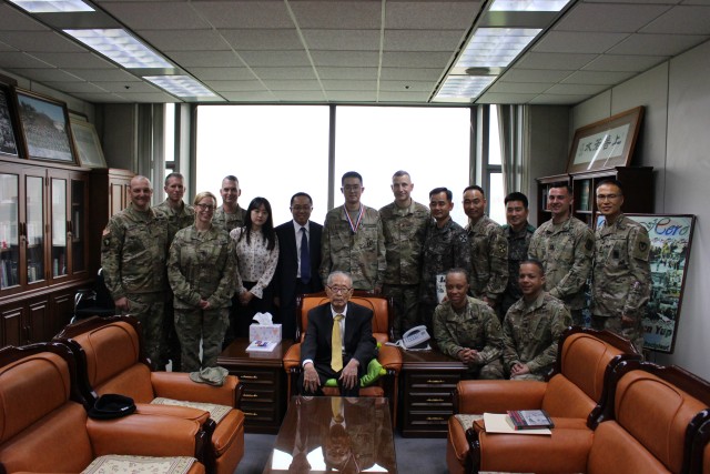 the 8th Army Leadership accompanies Sgt. Kwon to the award ceremony