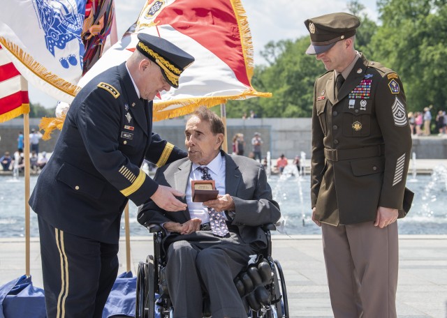 Former Sen. Dole, a decorated WWII veteran, promoted to colonel