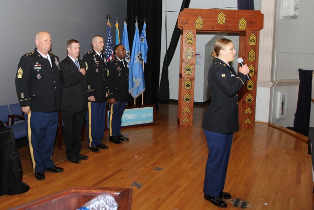 SPC Moorman sings the National Anthem at the 780 MI BDE NCO Induction Ceremony