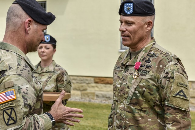 Lt. Gen. Christopher Cavoli awards Brig. Gen. Christopher LaNeve with The Legion of Merit