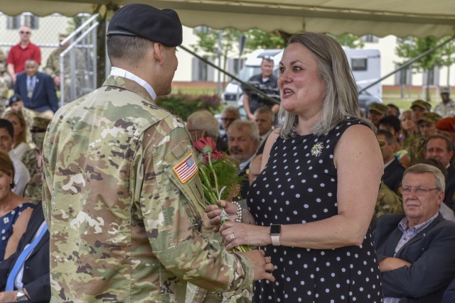 Kimberly LaNeve receives flowers at 7th ATC's Change of Command ceremony