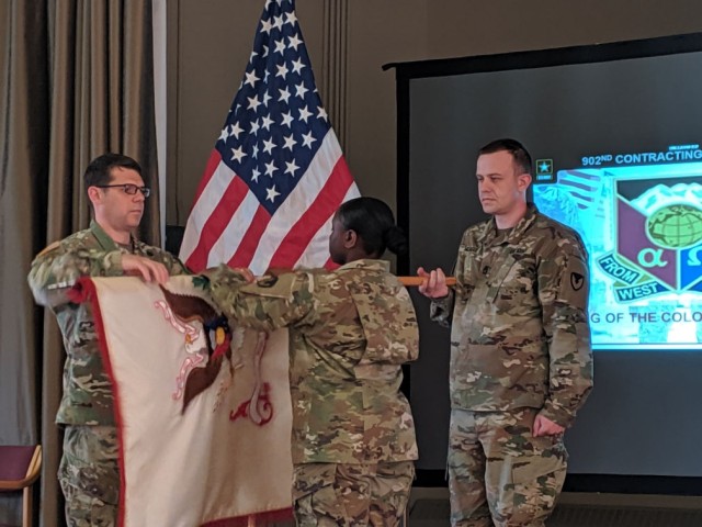 902nd Contracting Battalion cases its colors for deployment