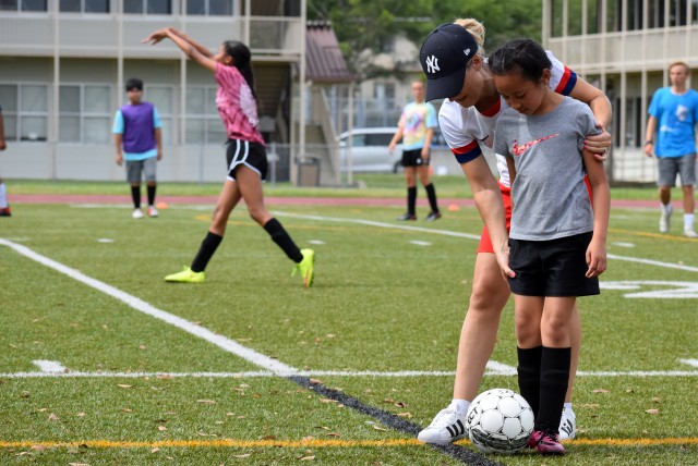 Soccer champs hold clinic with Camp Zama players