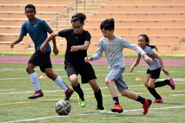 Soccer champs hold clinic with Camp Zama players