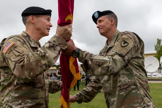 Flag passed, Col. McDonald assumes command