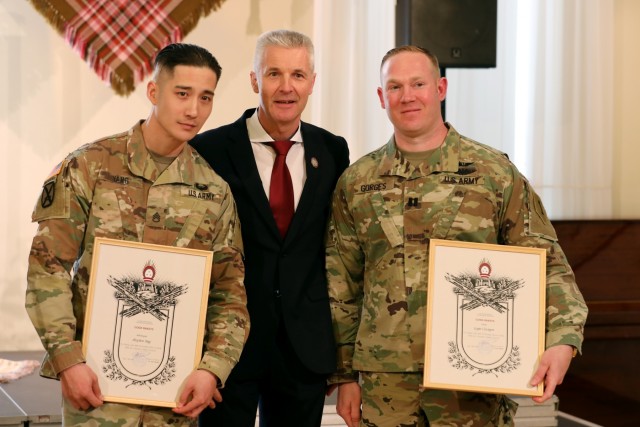 Latvian Minister of Defence honors U.S. Soldiers during the centennial celebration of the Latvian War for Independence and their Armed Forces