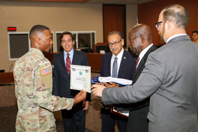 Fort Bliss warrior and professional recognized by El Paso Commisioner's Court