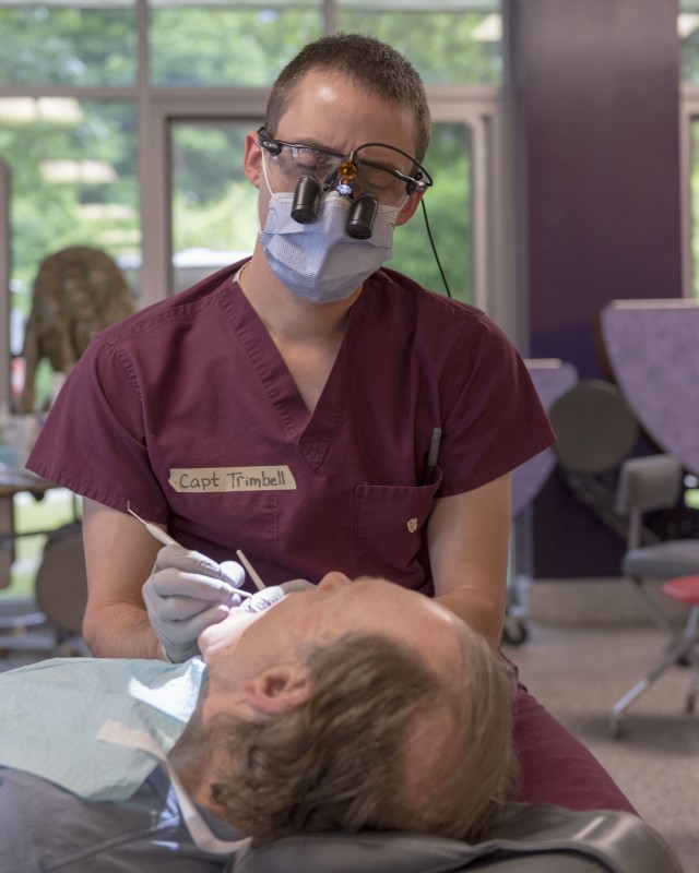 Dentists provide no-cost care while operating in field conditions