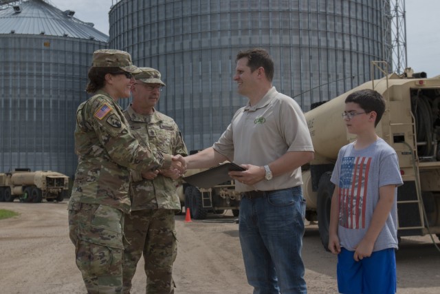 Iowa Army National Guard convoy fuels up at local co-op