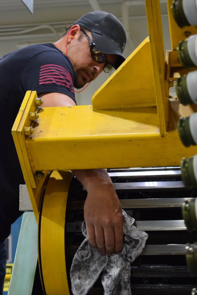 Crane Army maintenance team essential for munitions readiness.