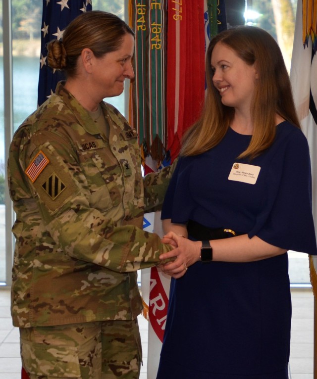 Col. Lucas presents award