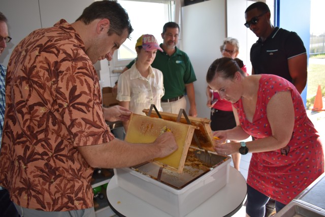 Beekeeper students celebrate graduation, honey harvest in Ansbach