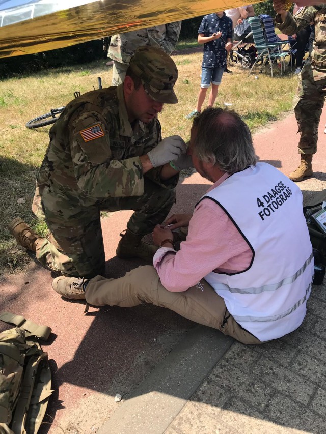Army medic puts duty first during large marching event