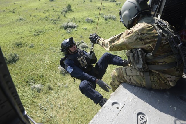 Indiana National Guard perform helicopter hoist operations