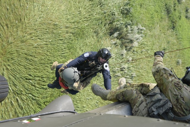 Indiana National Guard perform helicopter hoist operations
