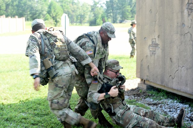 Army Reserve observer coach/ trainers ready infantry Soldiers during Army Total Force exercise