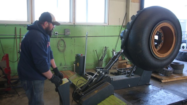 Sierra Army Depot mechanic operates tire foam removal tool