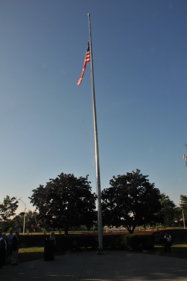The American flag rests at half-staff at the Detroit Arsenal.