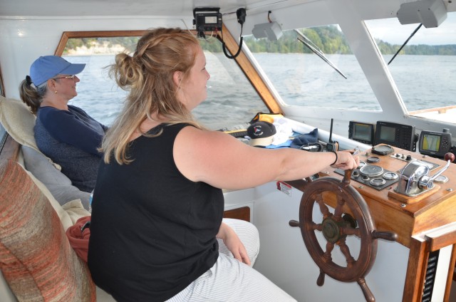 Seaman steers yacht